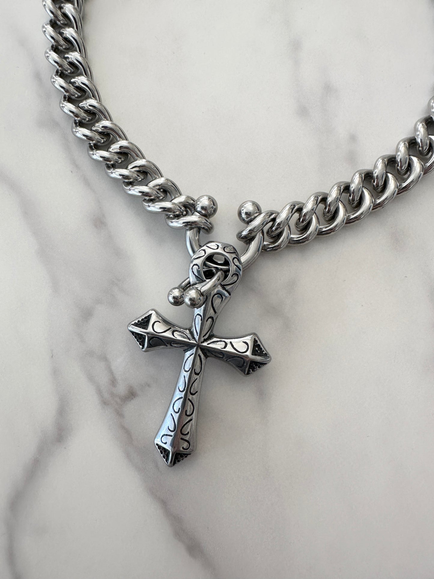 DOUBLE PIERCED CROSS
